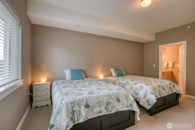 262 Oyhut Bay Blvd SW Unit 204, Ocean Shores, WA 98569 - carpeted bedroom featuring multiple windows and connected bathroom