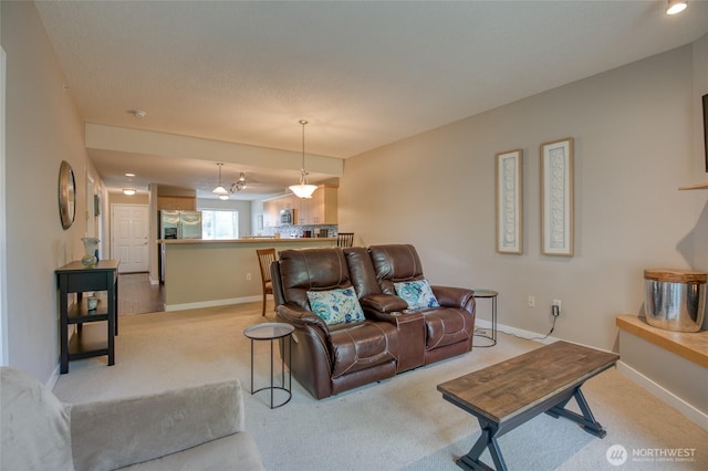 262 Oyhut Bay Blvd SW Unit 204, Ocean Shores, WA 98569 - living area featuring light colored carpet and baseboards