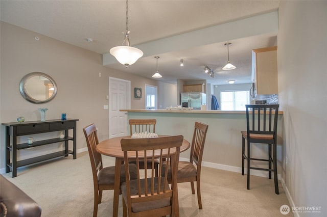262 Oyhut Bay Blvd SW Unit 204, Ocean Shores, WA 98569 - dining area featuring light carpet and baseboards