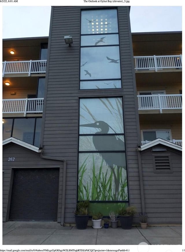 262 Oyhut Bay Blvd SW Unit 204, Ocean Shores, WA 98569 - view of property featuring an attached garage