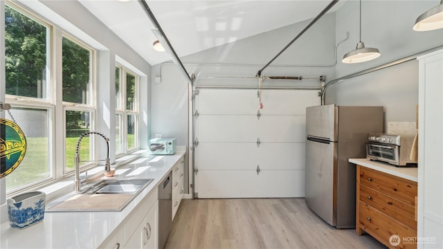 5513 Homestead Ln, Anacortes, WA 98221 - garage featuring freestanding refrigerator and a sink