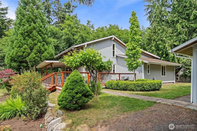 3555 S Holmes View Dr, Langley, WA 98260 - view of property exterior with a yard and a deck