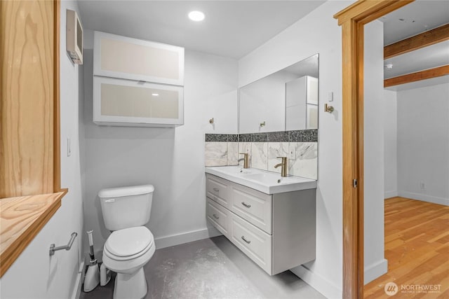3555 S Holmes View Dr, Langley, WA 98260 - bathroom with double vanity, backsplash, and recessed lighting