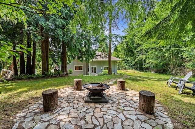 3555 S Holmes View Dr, Langley, WA 98260 - view of patio featuring a fire pit and an outdoor structure