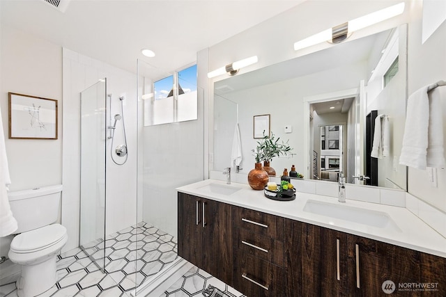 823 Warren Ave N, Seattle, WA 98109 - full bathroom with double vanity and a walk in shower