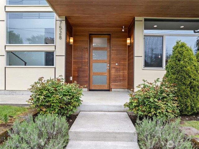 7528 21st Ave SW, Seattle, WA 98106 - entrance to property featuring covered porch and stucco siding