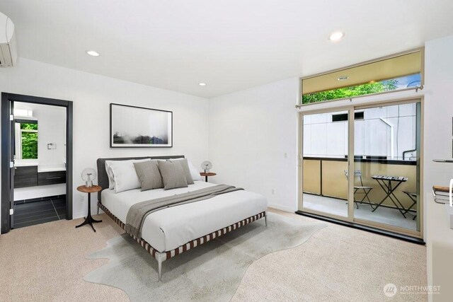 7528 21st Ave SW, Seattle, WA 98106 - carpeted bedroom featuring a wall unit AC, recessed lighting, and ensuite bathroom