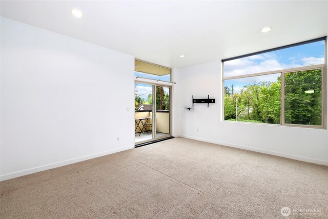 7528 21st Ave SW, Seattle, WA 98106 - carpeted empty room with recessed lighting