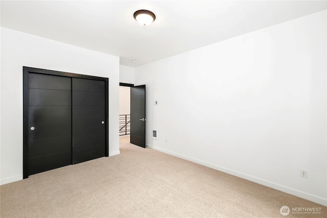 7528 21st Ave SW, Seattle, WA 98106 - unfurnished bedroom with carpet and baseboards
