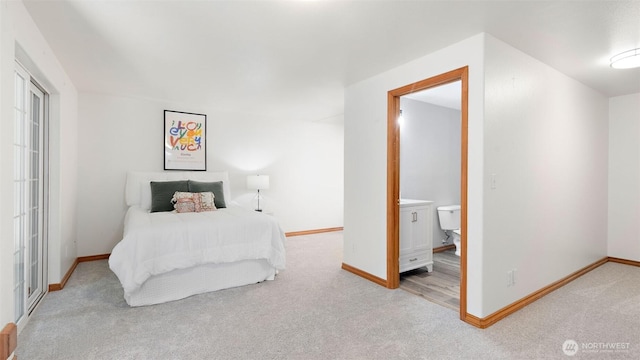 4762 NE Tree Ridge Ln, Poulsbo, WA 98370 - bedroom featuring light colored carpet and baseboards