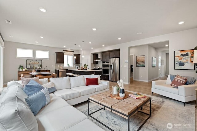 11433 SE 84th St Unit 41, Newcastle, WA 98056 - living area with recessed lighting and light wood finished floors