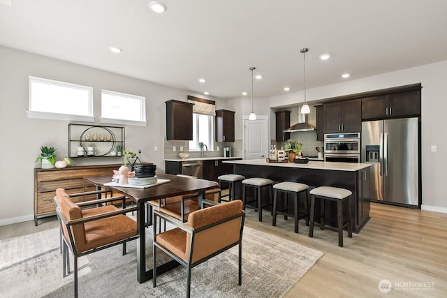 11433 SE 84th St Unit 41, Newcastle, WA 98056 - dining area featuring light wood-type flooring and recessed lighting