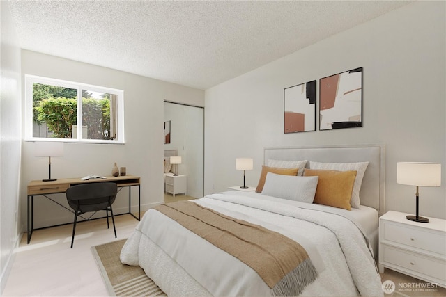 17514 151st Ave SE Unit 1-4, Renton, WA 98058 - bedroom with a textured ceiling and a closet