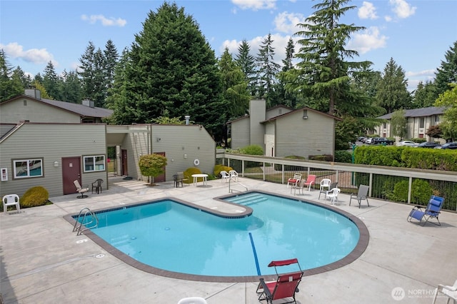 17514 151st Ave SE Unit 1-4, Renton, WA 98058 - community pool featuring a patio