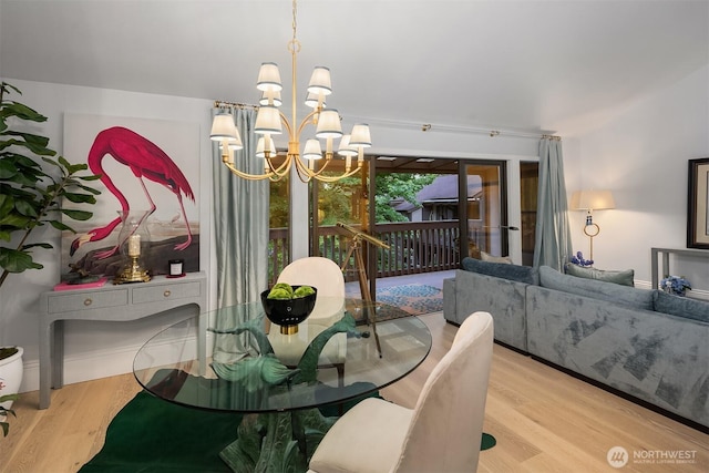1518 NE 140th St Unit C6, Seattle, WA 98125 - dining area featuring wood finished floors and a chandelier