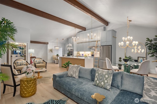 1518 NE 140th St Unit C6, Seattle, WA 98125 - living room featuring a chandelier and light wood finished floors