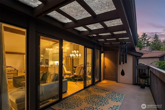 1518 NE 140th St Unit C6, Seattle, WA 98125 - exterior entry at dusk featuring a pergola and a balcony