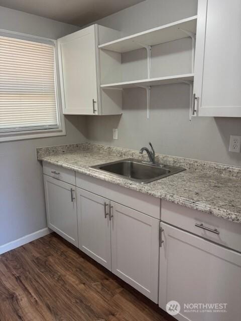 330 SW 5th Ave Unit 336, Ephrata, WA 98823 - kitchen with open shelves, white cabinets, and dark wood-style flooring