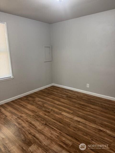 330 SW 5th Ave Unit 336, Ephrata, WA 98823 - empty room with dark wood finished floors and baseboards