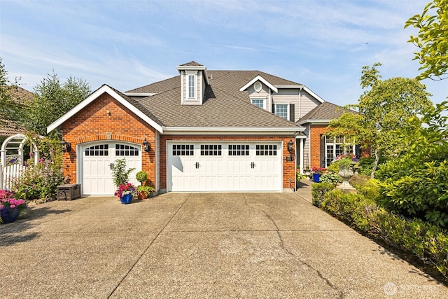 5422 21st Avenue Ct NE, Tacoma, WA 98422 - traditional-style house featuring brick siding, a garage, concrete driveway, and roof with shingles