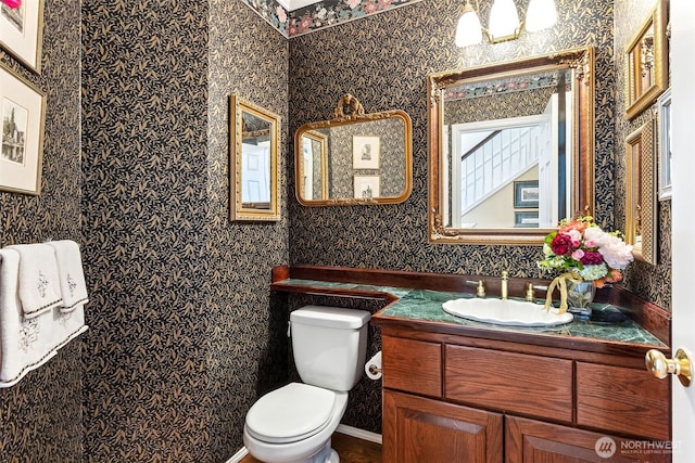 5422 21st Avenue Ct NE, Tacoma, WA 98422 - bathroom featuring wallpapered walls and vanity