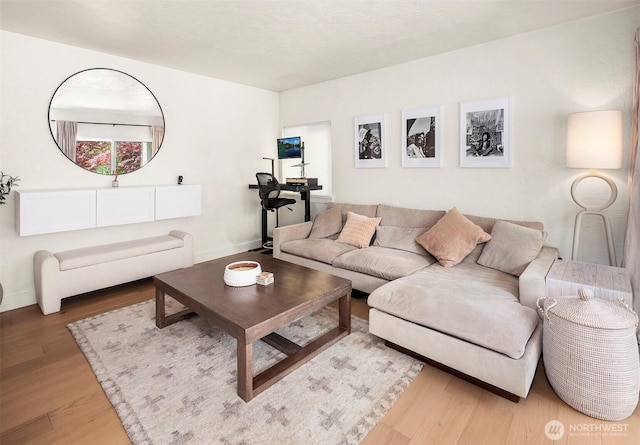 5801 Phinney Ave N Unit 103, Seattle, WA 98103 - living room with wood finished floors and baseboards