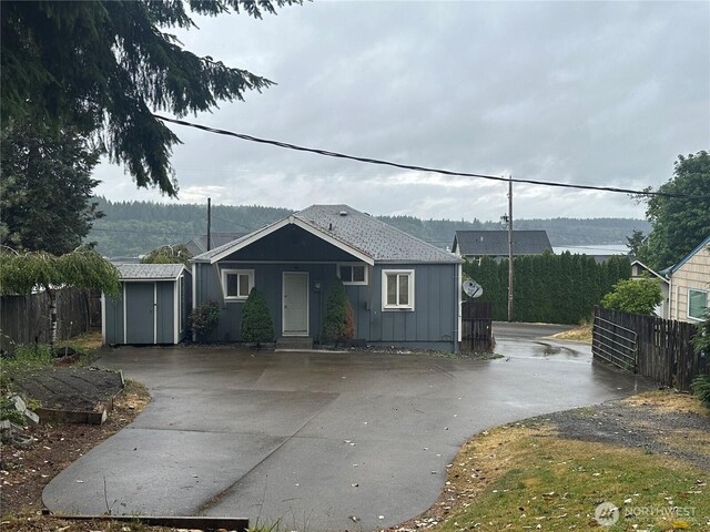 1421 Fairmount Ave, Shelton, WA 98584 - bungalow featuring a storage shed and driveway