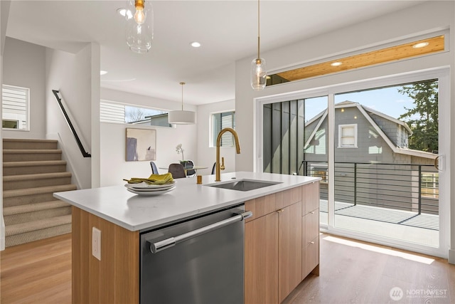 6732 21st Ave SW, Seattle, WA 98106 - kitchen with dishwasher, light wood finished floors, a kitchen island with sink, modern cabinets, and recessed lighting
