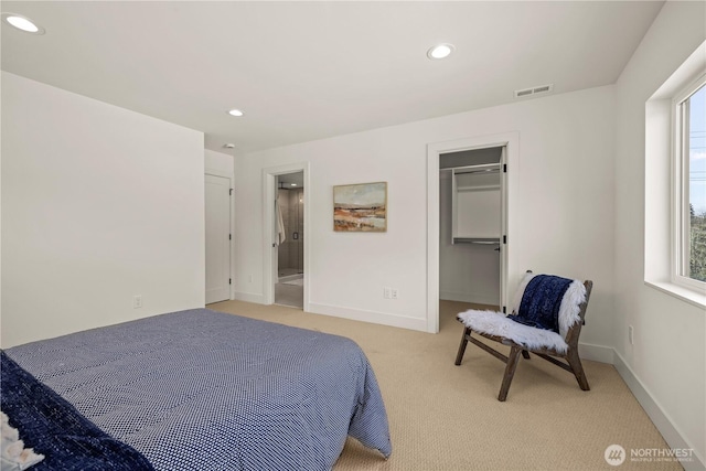 6732 21st Ave SW, Seattle, WA 98106 - bedroom with light colored carpet, recessed lighting, and a spacious closet