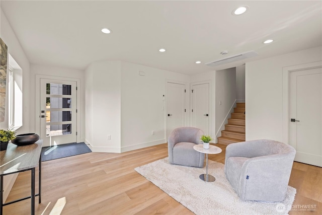 6732 21st Ave SW, Seattle, WA 98106 - living area with stairway, light wood finished floors, and recessed lighting