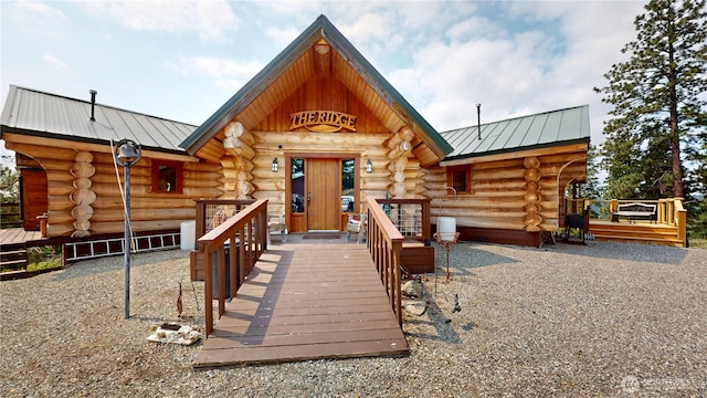 76 Buck Rd, Wauconda, WA 98859 - log home featuring log exterior, a metal roof, and a standing seam roof
