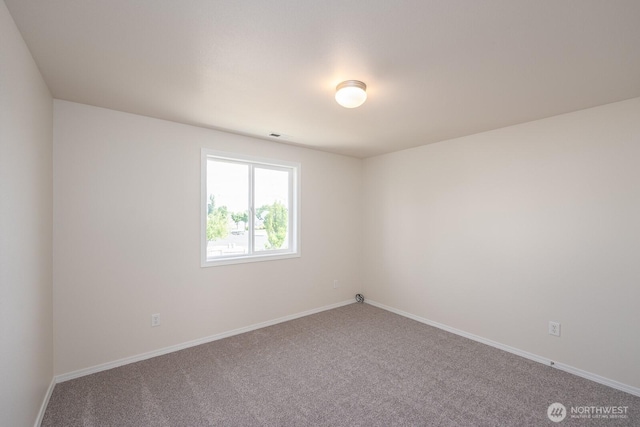 510 Trout Ave NE, Moses Lake, WA 98837 - empty room featuring carpet flooring