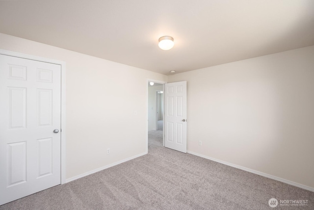 510 Trout Ave NE, Moses Lake, WA 98837 - spare room with carpet and baseboards