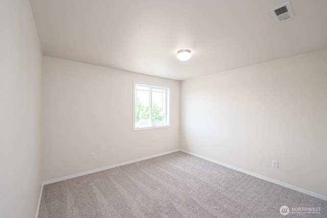 510 Trout Ave NE, Moses Lake, WA 98837 - carpeted spare room with baseboards