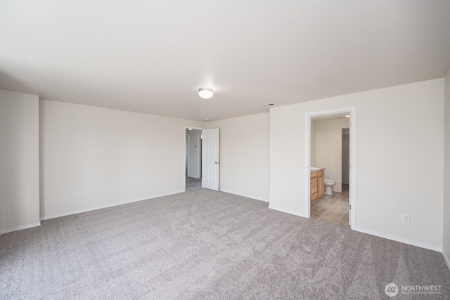 510 Trout Ave NE, Moses Lake, WA 98837 - empty room featuring light colored carpet and baseboards