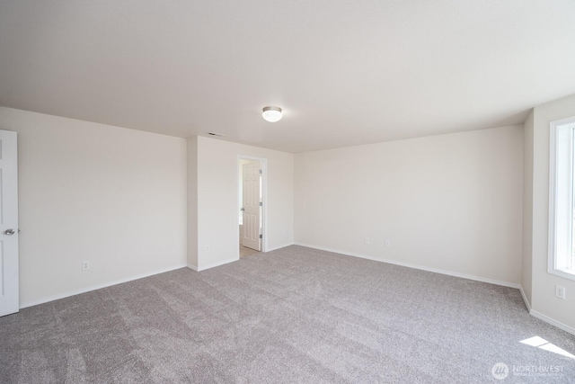 510 Trout Ave NE, Moses Lake, WA 98837 - empty room featuring carpet floors and baseboards