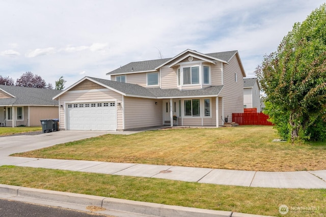510 Trout Ave NE, Moses Lake, WA 98837 - traditional home with an attached garage, concrete driveway, and a shingled roof