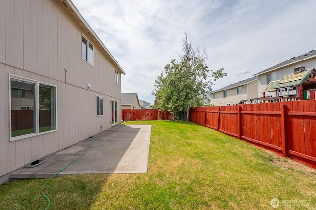 510 Trout Ave NE, Moses Lake, WA 98837 - fenced backyard with a patio area and a residential view