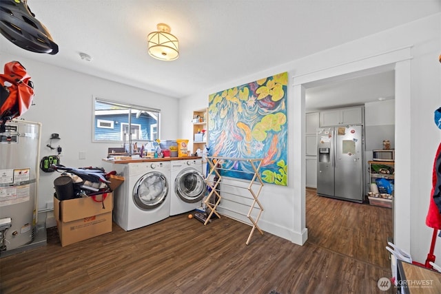 2413 Queen St, Bellingham, WA 98229 - laundry area with washing machine and dryer, water heater, and wood finished floors
