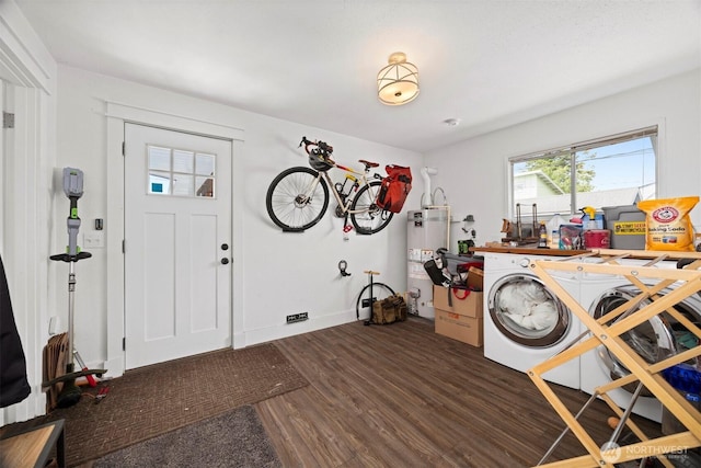 2413 Queen St, Bellingham, WA 98229 - washroom featuring water heater, dark wood finished floors, and independent washer and dryer