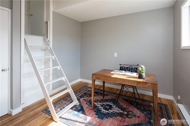 2413 Queen St, Bellingham, WA 98229 - home office with a baseboard radiator and wood finished floors