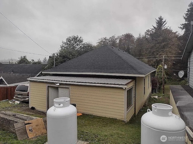 1345 Larch St, Raymond, WA 98577 - view of side of property with roof with shingles