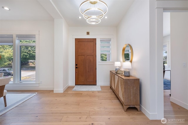 6209 32nd Ave NE, Seattle, WA 98115 - entrance foyer featuring light wood-style flooring, a chandelier, and recessed lighting