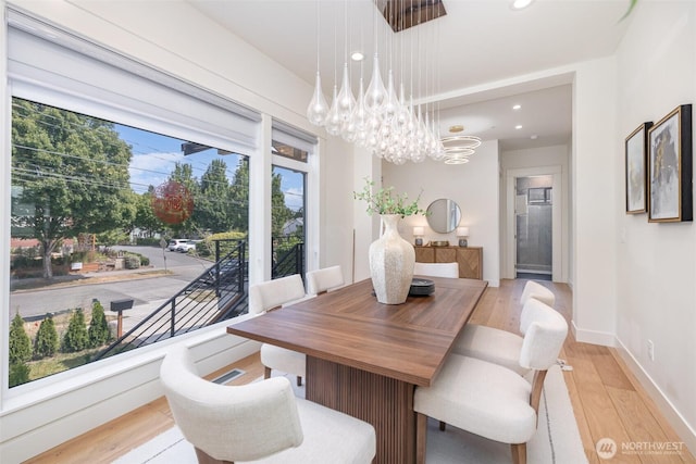 6209 32nd Ave NE, Seattle, WA 98115 - dining area with a chandelier, light wood-type flooring, and recessed lighting