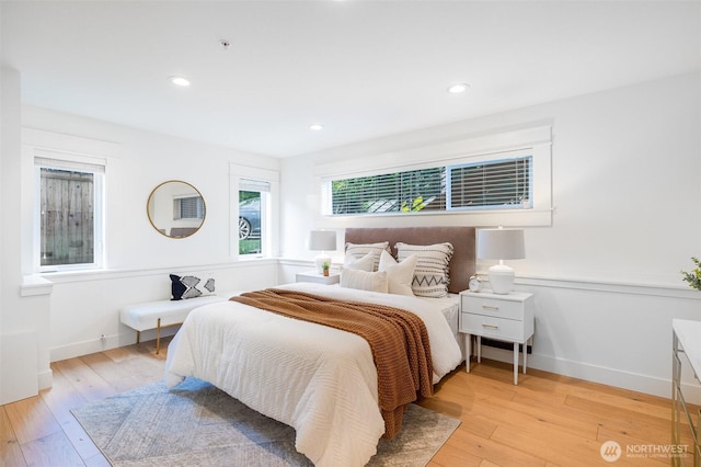 6209 32nd Ave NE, Seattle, WA 98115 - bedroom with light wood-style flooring and recessed lighting
