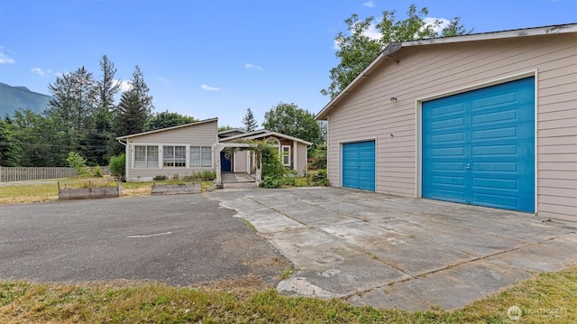41427 Mountain View Pl E, Gold Bar, WA 98251 - view of front of property with concrete driveway and a garage