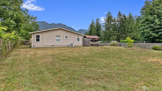 41427 Mountain View Pl E, Gold Bar, WA 98251 - back of property featuring a fenced backyard and crawl space