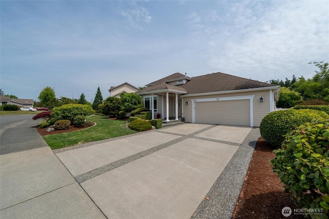 2108 S 18th St, Mount Vernon, WA 98274 - view of front of property featuring an attached garage, concrete driveway, and a front lawn