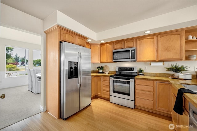 2108 S 18th St, Mount Vernon, WA 98274 - kitchen featuring appliances with stainless steel finishes, recessed lighting, light countertops, open shelves, and light wood-style flooring
