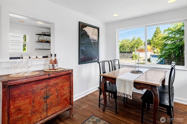 2711 NW 80th St, Seattle, WA 98117 - dining space featuring dark wood-style flooring, a dry bar, and recessed lighting